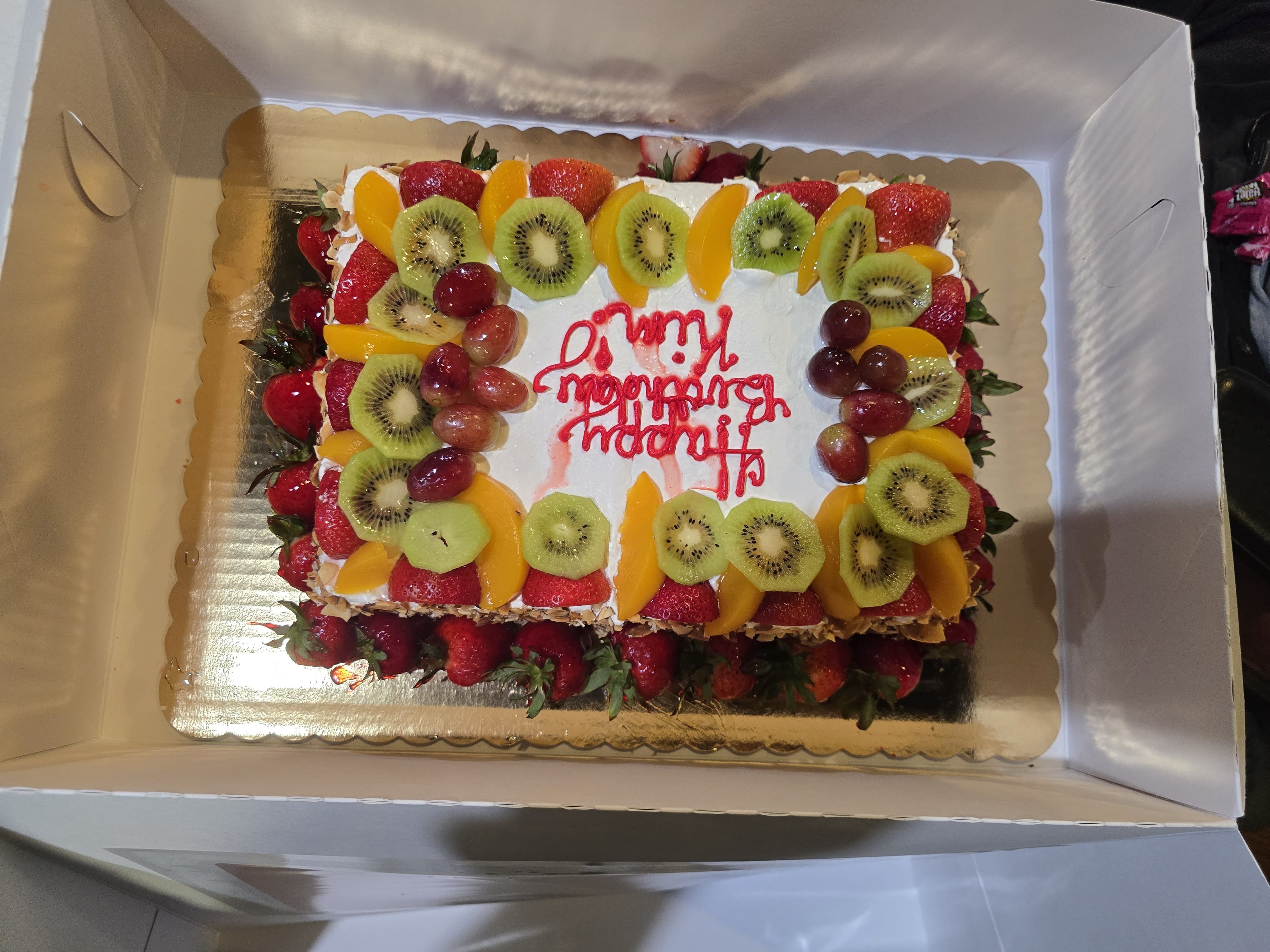 SCI Support Group April 2026 meeting with another perspective of the cake.