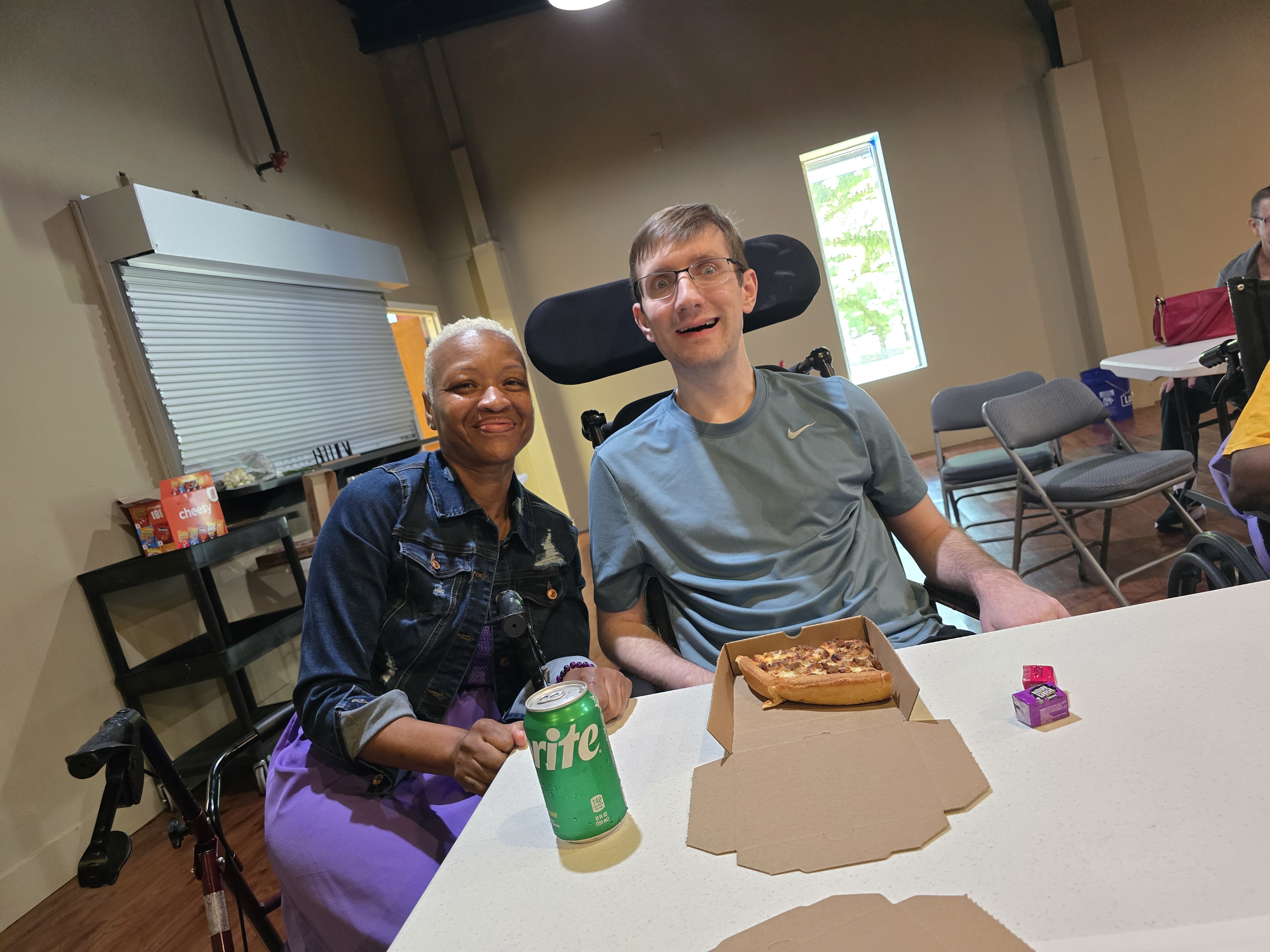 SCI Support Group April 2026 meeting members Kim and Johnathon.