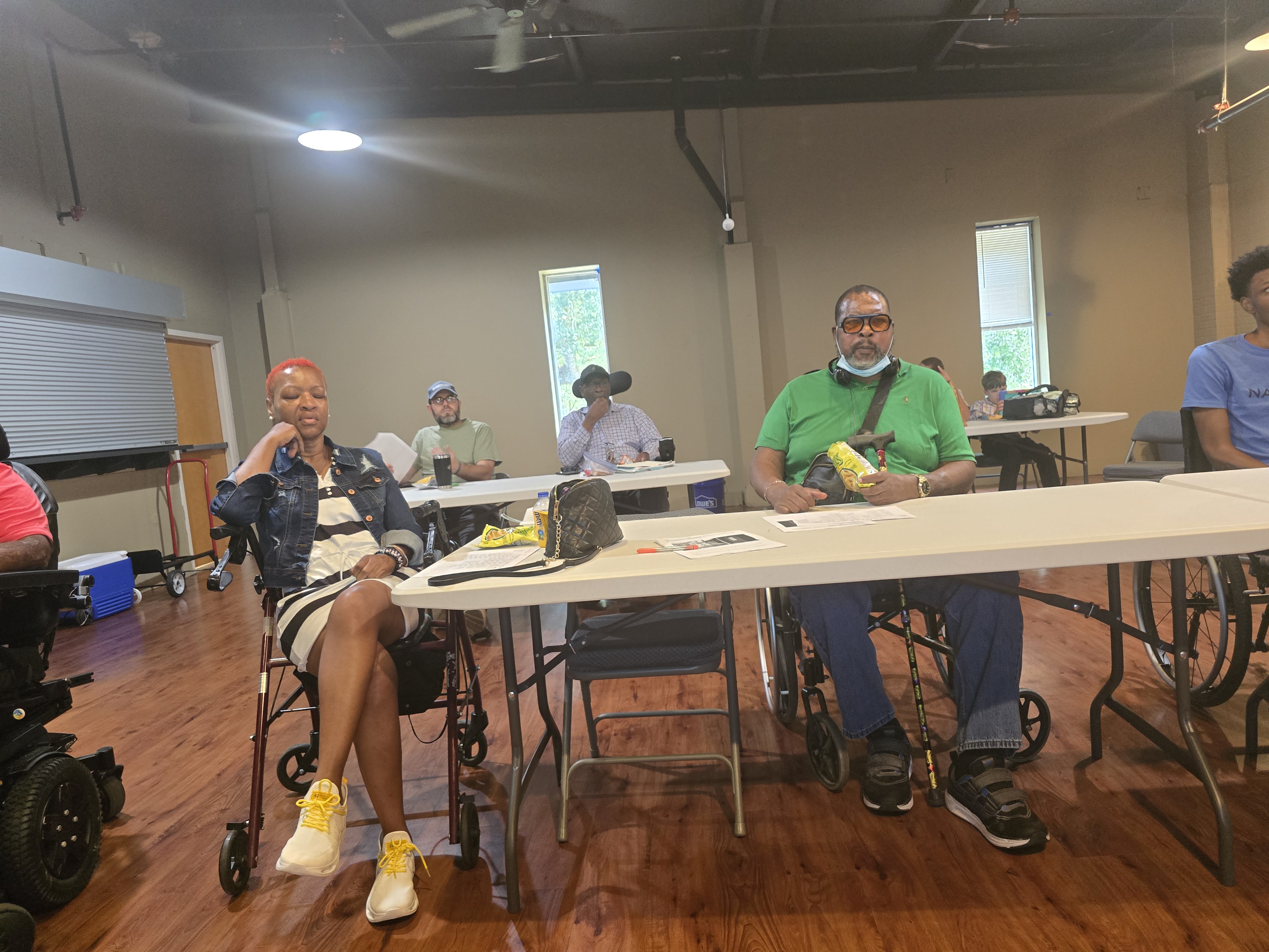 Members listening during the September 2026 Spinal Cord Injury Support Group meeting in Mobile, Alabama.