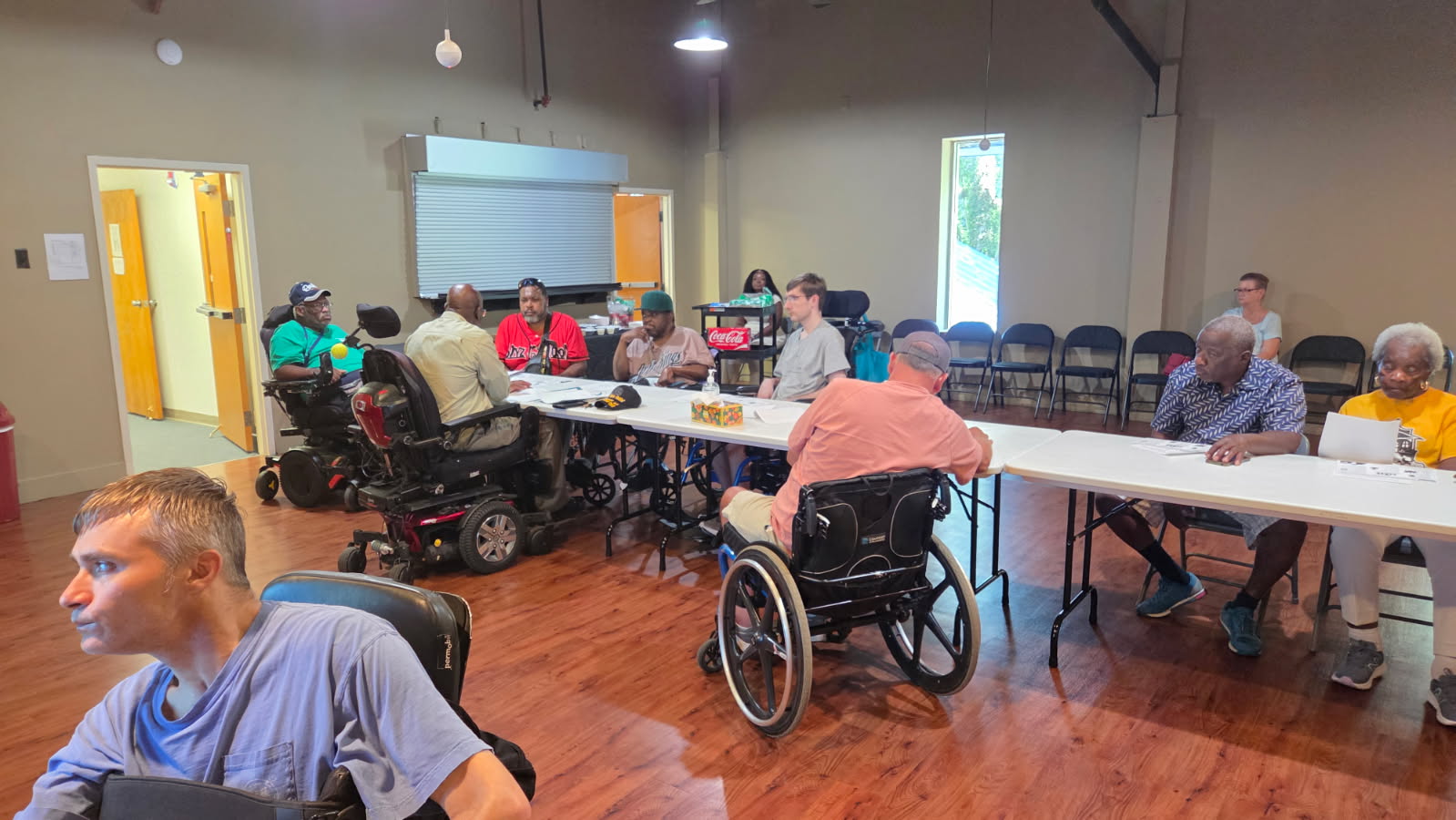 Attendees at the July 2025 SCI meeting at the Independent Living Center of Mobile.