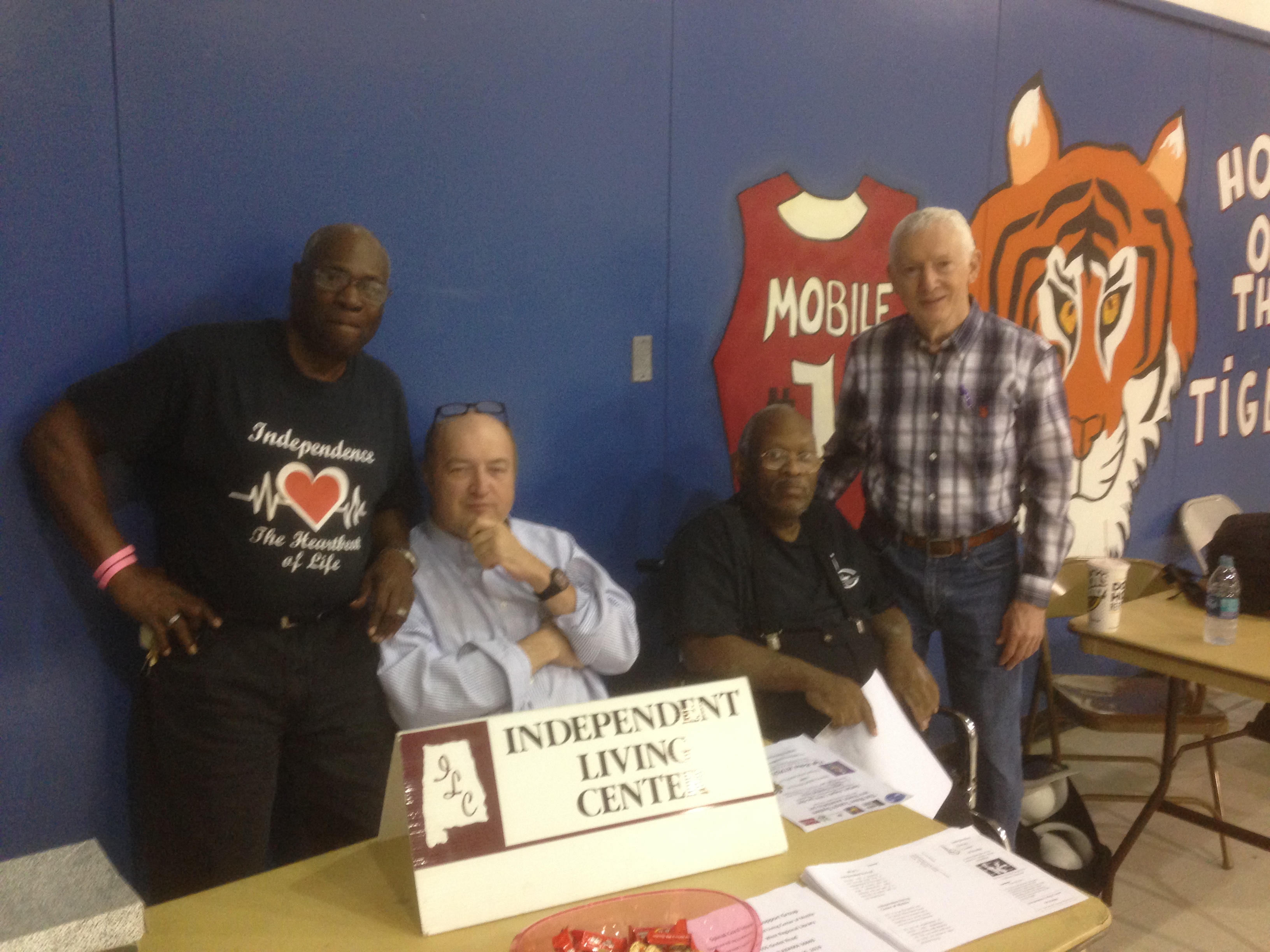 Independent Living Center staff booth at Mobile Patriots game — August 4, 2019.